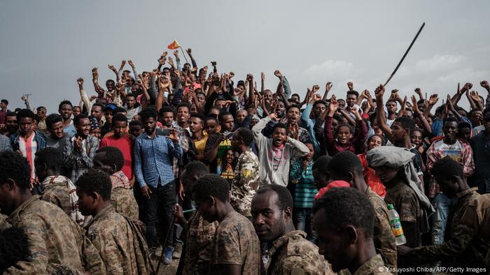People react as captive Ethiopian soldiers walk towards Mekele Rehabilitation Center