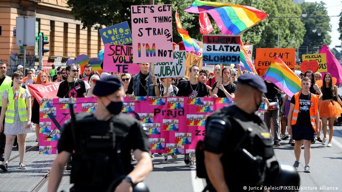 Two police officers stand guard of the Pride parade in Zagreb