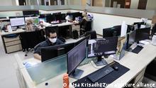 June 5, 2020, Bogor, West Java, Indonesia: A civil servant working while wearing a face mask as a preventive measure in a government office during the transition period..Jakarta and its surrounding areas, government extended the large-scale social restriction until at least the end of June as the city enters whatâs called ''transition period'' in its fight against the coronavirus COVID-19 pandemic. During the transition period, the Government of Indonesia also set civil servants to return to work in offices alternately with restrictions on the number of employees working in an office and strict health protocols towards what the government called new normal. (Credit Image: © Risa Krisadhi/SOPA Images via ZUMA Wire