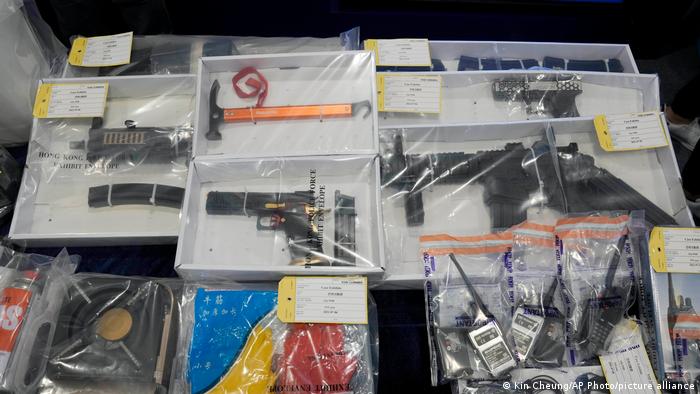 Confiscated evidence is displayed during a news conference