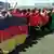Die deutsche "Nationalmannschaft" nimmt neben der angolanischen und brasilianischen Aufstellung (Foto Jochen Faget)
