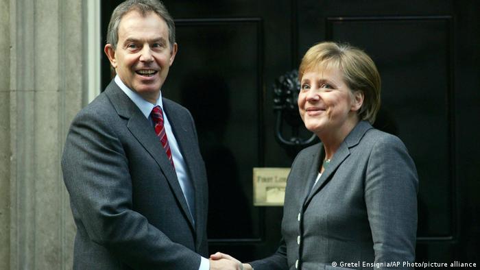 Angela Merkel y Tony Blair.