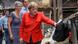 Merkel pats a cow Merkel pats a cow