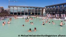 Guests enjoy the thermal waters of the Blue Lagoon (Blaa Ionid), Iceland, Polar Regions