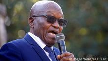 FILE PHOTO: South Africa's former President Jacob Zuma, who faces fraud and corruption charges, speaks to supporters after appearing at the High Court in Pietermaritzburg, South Africa, May 17, 2021. REUTERS/Rogan Ward/File Photo