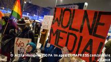February 10, 2021, Warsaw, Poland: A protester holds a placard saying Free Media! during the protest..Several private TV and radio stations and web portals in Poland took themselves off the air on Wednesday in protest against a proposed media advertising tax that they say threatens the industryâs independence and its diversity of views. In place of their usual shows, the outlets ran written or spoken slogans like âThis used to be your favourite programâ and âMedia without choiceâ. In the evening people gathered outside the TVP INFO (Polish Information TV) headquarters to protest the planned new advertising tax that they view as an attempt by the countryâs right-wing government to undermine press freedoms. (Credit Image: © Attila Husejnow/SOPA Images via ZUMA Wire