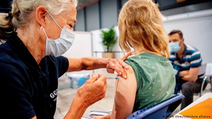Girl being vaccinated in the Netherlands