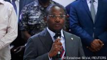 Haiti's interim Prime Minister Claude Joseph addresses the audience after suspects in the assassination of President Jovenel Moise, who was shot dead early Wednesday at his home, were shown to the media, in Port-au-Prince, Haiti July 8, 2021. REUTERS/Estailove St-Val NO RESALES. NO ARCHIVES