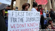 11.07.21 *** Activists hold posters during a rally in memory of Pirveli TV channel cameraman Alexander Lashkarava, a victim of violence against LGBT+ activists and journalists last Monday, in Tbilisi, Georgia July 11, 2021. REUTERS/Irakli Gedenidze