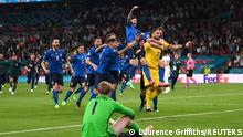 Soccer Football - Euro 2020 - Final - Italy v England - Wembley Stadium, London, Britain - July 11, 2021 Italy's Gianluigi Donnarumma celebrates winning Euro 2020 with teammates Pool via REUTERS/Laurence Griffiths
