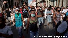People shout slogans against the government during a protest against and in support of the government, amidst the coronavirus disease (COVID-19) outbreak, in Havana, Cuba July 11, 2021. REUTERS/Alexandre Meneghini