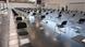 An empty waiting hall filled with chairs large distances apart from each other at a Munich vaccination center An empty waiting hall filled with chairs large distances apart from each other at a Munich vaccination center