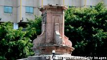 View of an empty pedestal after the statue of Italian navigator Christopher Columbus was removed at Reforma Avenue, in Mexico City on October 11, 2020. - Mexican authorities on Saturday removed a statue of Christopher Columbus that stood in the capital, two days before protesters planned to knock it down during events commemorating the Italian navigator's arrival in the Americas. (Photo by ALFREDO ESTRELLA / AFP) (Photo by ALFREDO ESTRELLA/AFP via Getty Images)