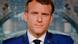 Macron seen on a TV screen Macron seen on a TV screen