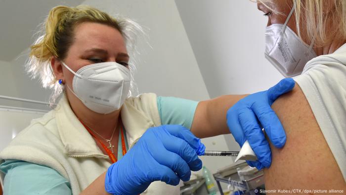 A Czech doctor administers a coronavirus vaccine at a clinic in Karlovy Vary.