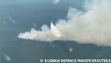 A plane makes a water drop to fight a forest fire in the region of Yakutia in eastern Siberia, Russia, in this still image taken from video released July 14, 2021. Ministry of Defence of the Russian Federation/Handout via REUTERS ATTENTION EDITORS - THIS IMAGE WAS PROVIDED BY A THIRD PARTY. NO RESALES. NO ARCHIVES. MANDATORY CREDIT.