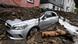 Carro sob escombros após chuvas em Hagen, na Alemanha Carro sob escombros após chuvas em Hagen, na Alemanha