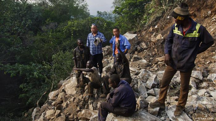 A group of people on a rocky outcrop