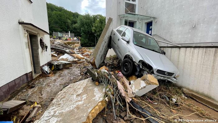 Damaged houses and a destroyed automobile in Bad Münstereifel