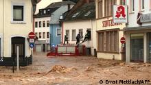 Trier, 15.7.2021***
Firemen standing on the roof of their vehicle climb into an inundatetd house in the flooded Ehrang neighbourhood in Trier, western Germany, on July 15, 2021. - Heavy rains and floods lashing western Europe have killed at least 33 people in Germany and left around 50 missing, as rising waters led several houses to collapse. (Photo by Ernst METTLACH / Fire Brigades City of Trier / AFP) / RESTRICTED TO EDITORIAL USE - MANDATORY CREDIT AFP PHOTO / Ernst METTLACH / Fire Brigades City of Trier - NO MARKETING - NO ADVERTISING CAMPAIGNS - DISTRIBUTED AS A SERVICE TO CLIENTS