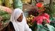 A trader sells fruits at a market in Mogadishu A trader sells fruits at a market in Mogadishu
