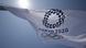 A flag bearing the Olympic rings and circular logo of the Tokyo 2020 Olympics A flag bearing the Olympic rings and circular logo of the Tokyo 2020 Olympics