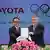 IOC President Thomas Bach (R) and Toyota's Akio Toyoda 