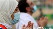 Muslim pilgrims pray near Mount Arafat, also known as Jabal al-Rahma (Mount of Mercy), southeast of the holy city of Mecca
