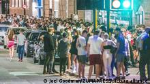July 19, 2021, Manchester, Greater Manchester, UK: Manchester, UK. People queue outside FAC 51 nightclub in Manchester City Centre after midnight and so-called '' Freedom Day '' at 00:00 on 19th July 2021 , when regulations on wearing of masks , social distancing and other measures designed to prevent the spread of Coronavirus in England are relaxed . The number of Covid-19 infections in England is increasing rapidly , along with the number of infected patients requiring hospital treatment and the British Prime Minister has gone in to isolation after being exposed to a Covid-positive Secretary of State for Health (Credit Image: © Joel Goodman/London News Pictures via ZUMA Press Wire