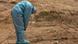 An exhausted health worker sighs at a burial ground during the height of India's COVID wave An exhausted health worker sighs at a burial ground during the height of India's COVID wave