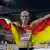 Verena Sailer celebrates after winning the Women's 100 meter final