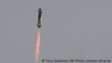 Blue Origin's New Shepard rocket launches carrying passengers Jeff Bezos, founder of Amazon and space tourism company Blue Origin, brother Mark Bezos, Oliver Daemen and Wally Funk, from its spaceport near Van Horn, Texas, Tuesday, July 20, 2021. (AP Photo/Tony Gutierrez)