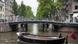 Gracht mit Boot in Amsterdam (Foto: dpa) Gracht mit Boot in Amsterdam (Foto: dpa)