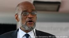 Ariel Henry speaks during his appointment as the new Prime Minister in Port-au-Prince, Haiti, Tuesday, July 20, 2021, weeks after the assassination of President Jovenel Moise at his home. (AP Photo/Matias Delacroix)