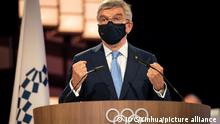 21.7.2021*** TOKYO, July 21, 2021 (Xinhua) -- International Olympic Committee (IOC) President Thomas Bach speaks during the 138th IOC Session in Tokyo, Japan, on July 20, 2021. The move of adding together into the Olympic motto of faster, higher, stronger was unanimously approved at the 138th IOC session here on Tuesday. (IOC/Handout via Xinhua)