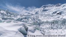 beautiful glacier on the sapu snow mountains against a blue sky, one of the sacred mountains of bon religion, biru county, nagqu prefecture, tibet ,China