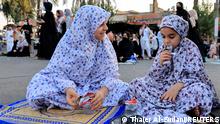 Iraqi Muslims girls attend Eid al-Adha prayers on the street outside Abu Hanifa mosque in Baghdad Adhamiya district,Iraq, July 20, 2021. REUTERS/Thaier Al-Sudani