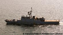 In this handout photo from the Royal Danish Air Force, the Iranian navy destroyer Sahand is seen sailing through the Baltic Sea off the island of Bornholm, a Danish island in the Baltic Sea off the south coast of Sweden, on Thursday, July 22, 2021. The Danish military said Thursday it spotted an Iranian destroyer and a large support vessel sailing through the Baltic Sea, likely heading to Russia for a military parade in the coming days. (Royal Danish Air Force via AP)