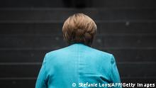 22.07.21 *** TOPSHOT - German Chancellor Angela Merkel arrives at the house of the Federal Press Conference (Bundespressekonferenz) on July 22, 2021 in Berlin, to address a press conference on national and international topics. (Photo by STEFANIE LOOS / AFP) (Photo by STEFANIE LOOS/AFP via Getty Images)