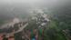 A photo showing an areal view of a flooded Indian village A photo showing an areal view of a flooded Indian village