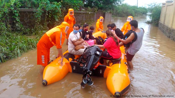 National Disaster Response Force (NDRF) shows NDRF personnel rescuing people 