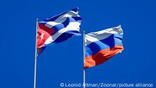 Beautiful national state flags of Russia and Cuba together at the sky background. 3D artwork concept.