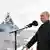 Юли 2021, Санкт Петербург: президентът Владимир Путин и военният министър Сергей Шойгу наблюдават военноморски парад