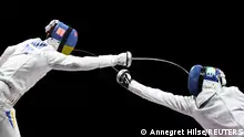 Tokyo 2020 Olympics - Fencing - Men's Individual Epee - Bronze medal match - Makuhari Messe Hall B - Chiba, Japan - July 25, 2021. Andrea Santarelli of Italy in action against Igor Reizlin of Ukraine REUTERS/Annegret Hilse