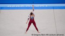 Sarah Voss, of Germany, performs her floor exercise routine during the women's artistic gymnastic qualifications at the 2020 Summer Olympics, Sunday, July 25, 2021, in Tokyo. (AP Photo/Gregory Bull)