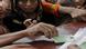Women affected by the floods queue up to receive food rations Women affected by the floods queue up to receive food rations