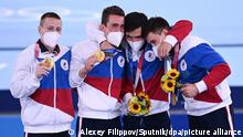 6607610 26.07.2021 Gold medallists, Denis Abliazin, David Belyavskiy, Artur Dalaloyan and Nikita Nagornyy of the Russian Olympic Committee's team pose on the podium during the victory ceremony for the artistic gymnastics men's team final at the Tokyo 2020 Olympic Games at Ariake Gymnastics Centre, in Tokyo, Japan. Alexey Filippov / Sputnik