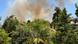 Smoke billows from a wildfire, as seen from Drosia, near Athens Smoke billows from a wildfire, as seen from Drosia, near Athens