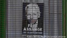 Free Assange poster seen in a window of a closed shop in Dublin city center during Level 5 Covid-19 lockdown. On Tuesday, 16 March 2021, in Dublin, Ireland. (Photo by Artur Widak/NurPhoto)