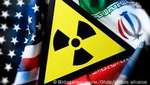 Fahnen von USA und Iran und Radioaktivitaet-Warnschild, iranisches Atomabkommen
